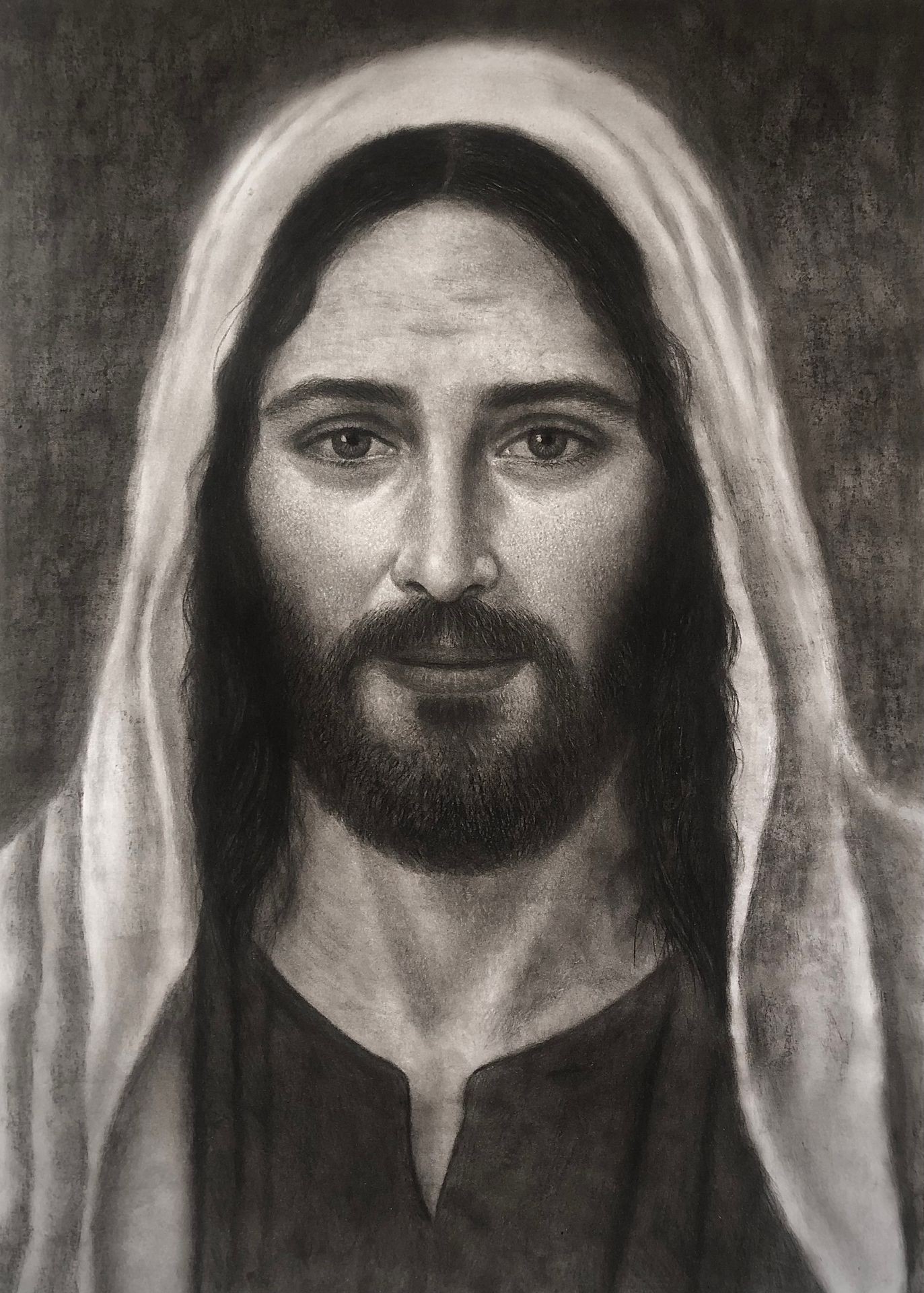 Drawing of a person with long hair and a beard, wearing a cloak or robe.